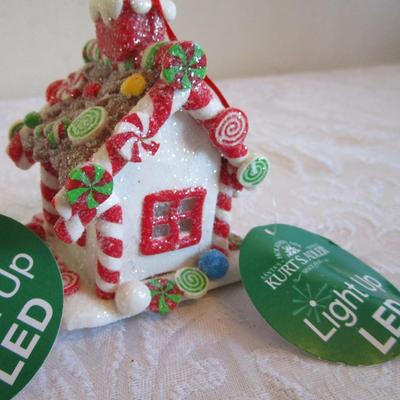 3 Light-up gingerbread house ornaments, 3 24' each bead garlands