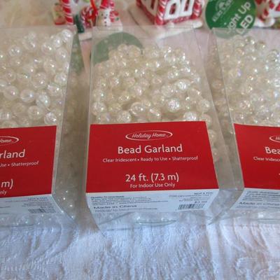 3 Light-up gingerbread house ornaments, 3 24' each bead garlands