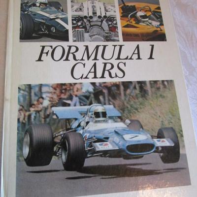 4 military books, 1 formula 1 cars book