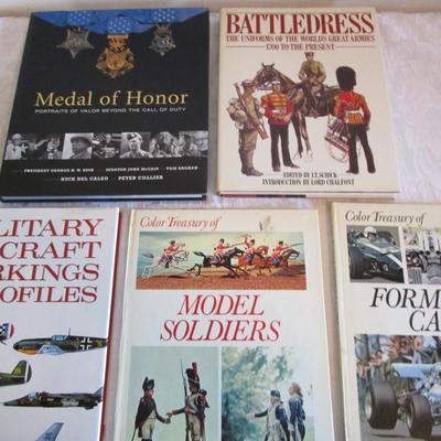 4 military books, 1 formula 1 cars book