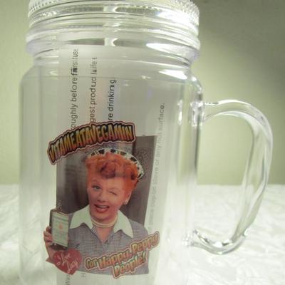 Plastic mug with Lucille Ball on it, and with lid