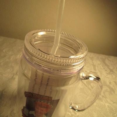 Plastic mug with Lucille Ball on it, and with lid