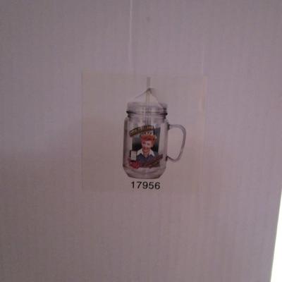 Plastic mug with Lucille Ball on it, and with lid