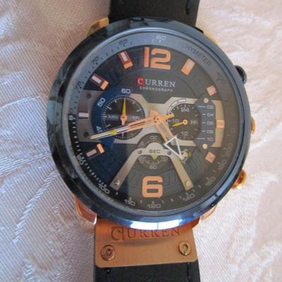 Sale Photo Thumbnail #287: date, second hand, water resistant up to 10M, black & gold, see pictures