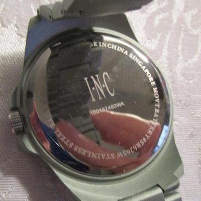 INC men's green high-impact sports watch, 46 MM