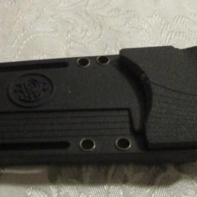 Smith & Wesson Model #SW7S fixed blade, serated knife