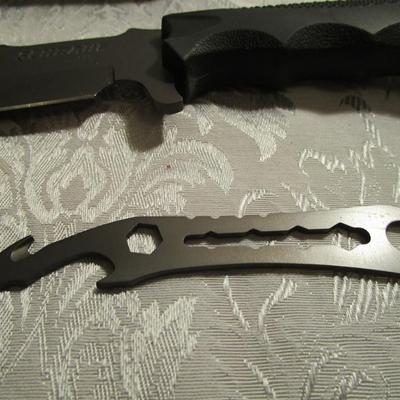 Schrade F27 survival knife SCHF27 butt of the handle can be used as a pry tool. Includes small handy pry tool.  High carbon stainless steel