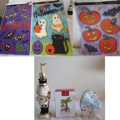 Sale Photo Thumbnail #429: 3 pkg Halloween window clings, 1 nutcracker soap dispenser, Hallmark Christmas ornament, 1 wood Easter egg decoration, all new, see pictures