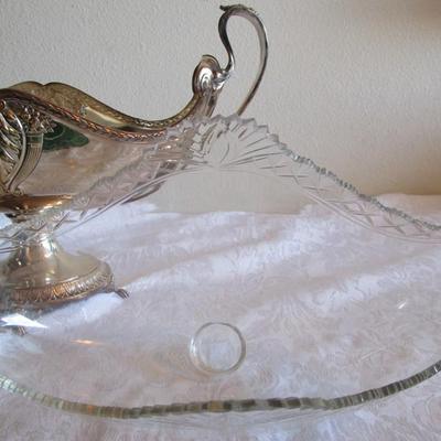 Silver-plated serving piece R173 with feet 9" tall x 15-1/2" handle to handle, insert is glass