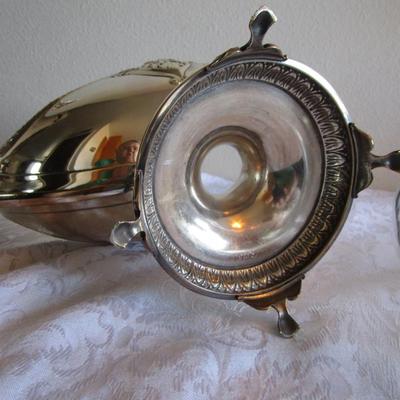 Silver-plated serving piece R173 with feet 9" tall x 15-1/2" handle to handle, insert is glass