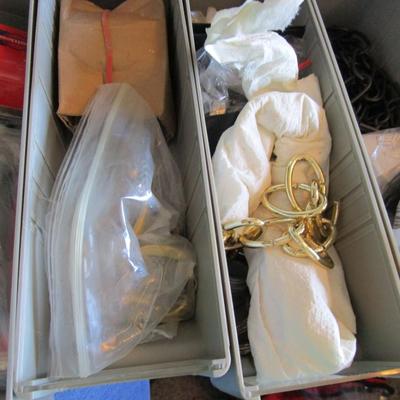 Metal parts cabinet with various hardware in 15 drawers