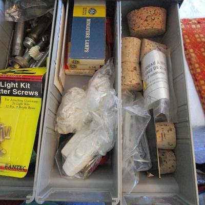 Metal parts cabinet with various hardware in 15 drawers