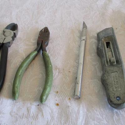 Dykes, box cutters, exacto knife