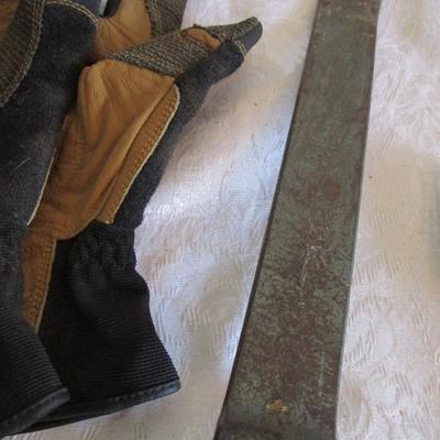 Pry bar, magnets, leather gloves, pliers