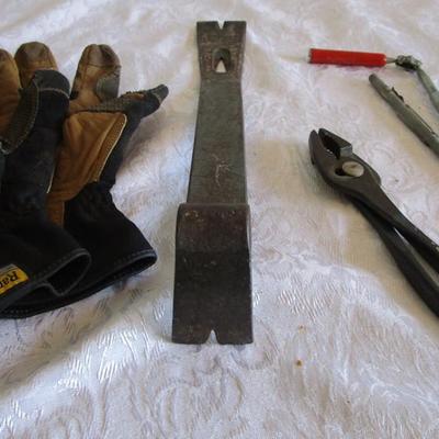 Pry bar, magnets, leather gloves, pliers