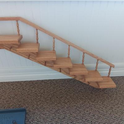 STAIR STEP WALL HUNG DISPLAY SHELF AND A COAT RACK