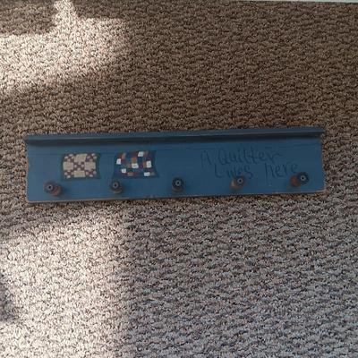 STAIR STEP WALL HUNG DISPLAY SHELF AND A COAT RACK