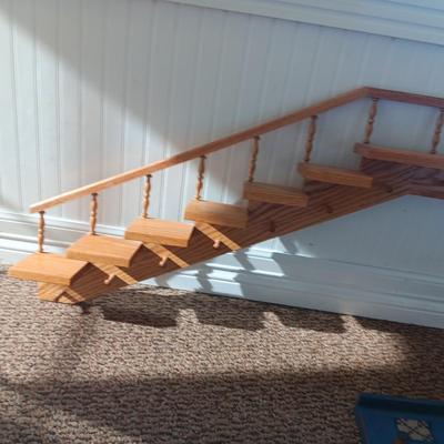 STAIR STEP WALL HUNG DISPLAY SHELF AND A COAT RACK