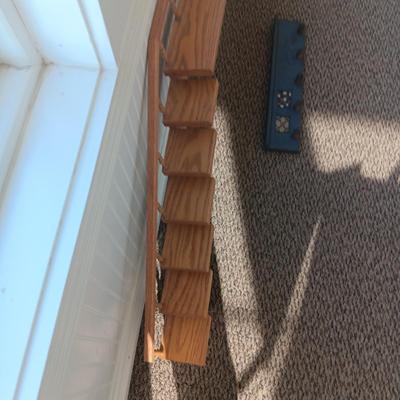 STAIR STEP WALL HUNG DISPLAY SHELF AND A COAT RACK