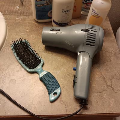 SHOWER CADDY, CLEANERS AND HAIR DRYER
