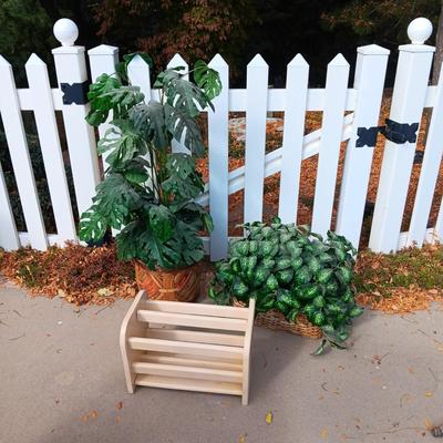 2 FAUX PLANTS AND A MAGAZINE RACK