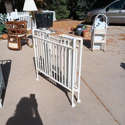 CHANGING TABLE, FOLDING PORTABLE CRIB, TOTE FULL OF BABY BLANKETS AND A STROLLER
