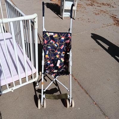 CHANGING TABLE, FOLDING PORTABLE CRIB, TOTE FULL OF BABY BLANKETS AND A STROLLER