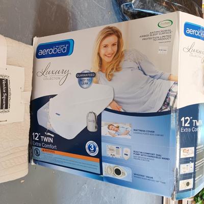 TWIN SIZE AEROBED AIR MATTRESS AND A NEW THROW BLANKET