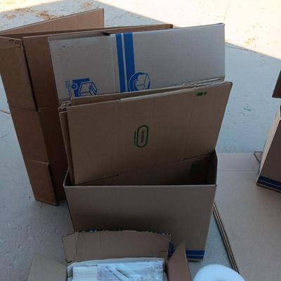 FOLDING DOLLY, MOVING BOXES, PACKING PAPER AND BUBBLE WRAP