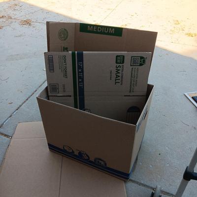 FOLDING DOLLY, MOVING BOXES, PACKING PAPER AND BUBBLE WRAP
