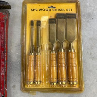 6 PC WOOD CHISELS, IRWIN CLAMPS, HACKSAW AND 18” PIPE WRENCH