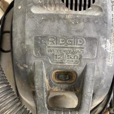 RIGID SHOP VACUUM, HUSKY WORK LIGHT, SAW HORSES, AND HEAVY DUTY 100’ EXTENSION CORD