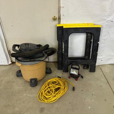 RIGID SHOP VACUUM, HUSKY WORK LIGHT, SAW HORSES, AND HEAVY DUTY 100’ EXTENSION CORD