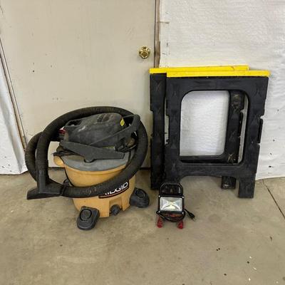 RIGID SHOP VACUUM, HUSKY WORK LIGHT, SAW HORSES, AND HEAVY DUTY 100’ EXTENSION CORD