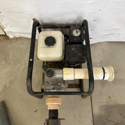 NORTH STAR 2” SEMI-TRASH WATER PUMP OPERATED BY A GAS 4HP HONDA MOTOR