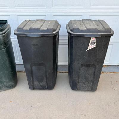 THREE 45 GALLON TRASH CANS ON WHEELS