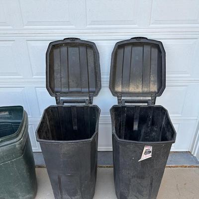 THREE 45 GALLON TRASH CANS ON WHEELS