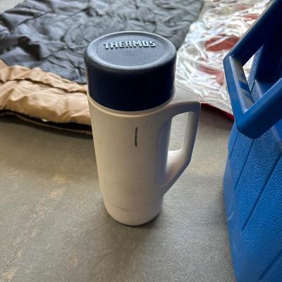 2 SLEEPING BAGS, TWIN INFLATABLE MATTRESS, COLEMAN LANTERN AND COOLER