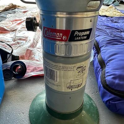 2 SLEEPING BAGS, TWIN INFLATABLE MATTRESS, COLEMAN LANTERN AND COOLER