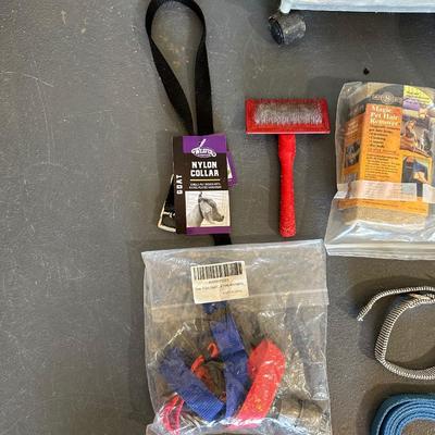 SOFT DOG BED, PARTIAL BAG OF DOG FOOD, FOOD STORAGE CONTAINER, GROOMING ITEMS AND MORE