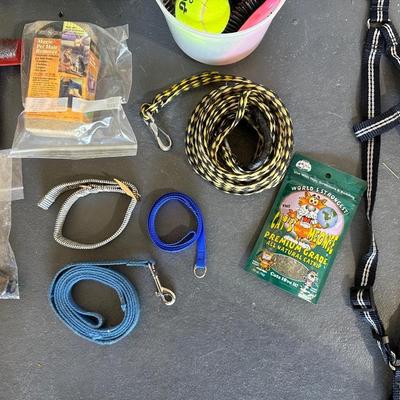 SOFT DOG BED, PARTIAL BAG OF DOG FOOD, FOOD STORAGE CONTAINER, GROOMING ITEMS AND MORE