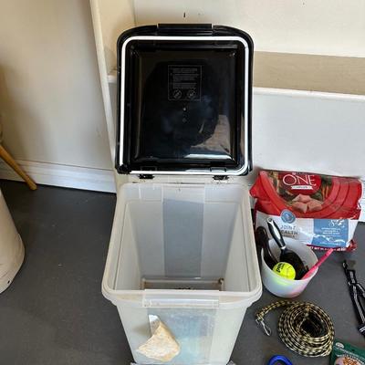 SOFT DOG BED, PARTIAL BAG OF DOG FOOD, FOOD STORAGE CONTAINER, GROOMING ITEMS AND MORE