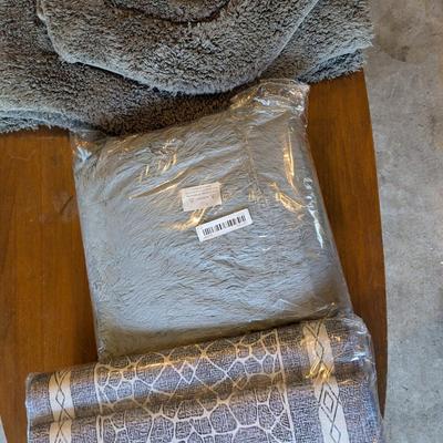 6 items: 3 GRAY new rugs; 5 total rugs and 1 blanket lot