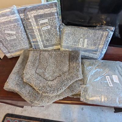 6 items: 3 GRAY new rugs; 5 total rugs and 1 blanket lot