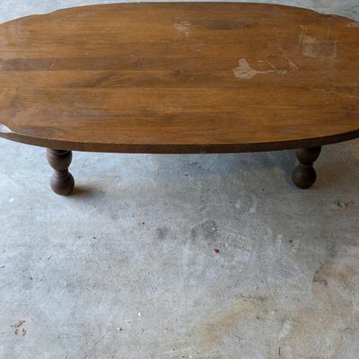 solid wood coffee table with 4 legs value: $150 lot 7833031