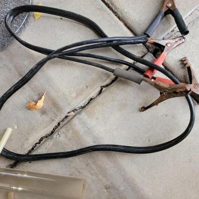 Lot of smalls, jumper cables, bungee cords , extensions cords
