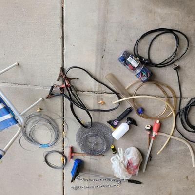 Lot of smalls, jumper cables, bungee cords , extensions cords