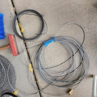 Lot of smalls, jumper cables, bungee cords , extensions cords