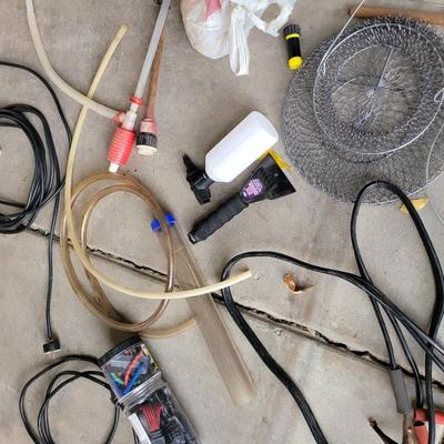 Lot of smalls, jumper cables, bungee cords , extensions cords
