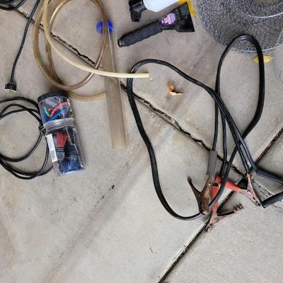 Lot of smalls, jumper cables, bungee cords , extensions cords